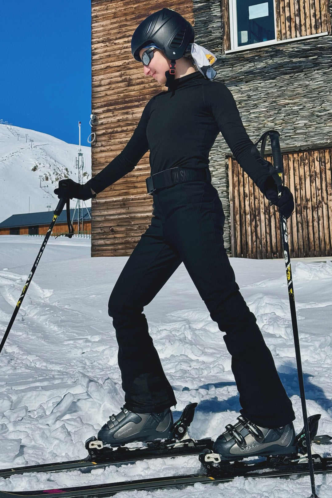 Pantalones de esquí negros ajustados con forro polar para mujer