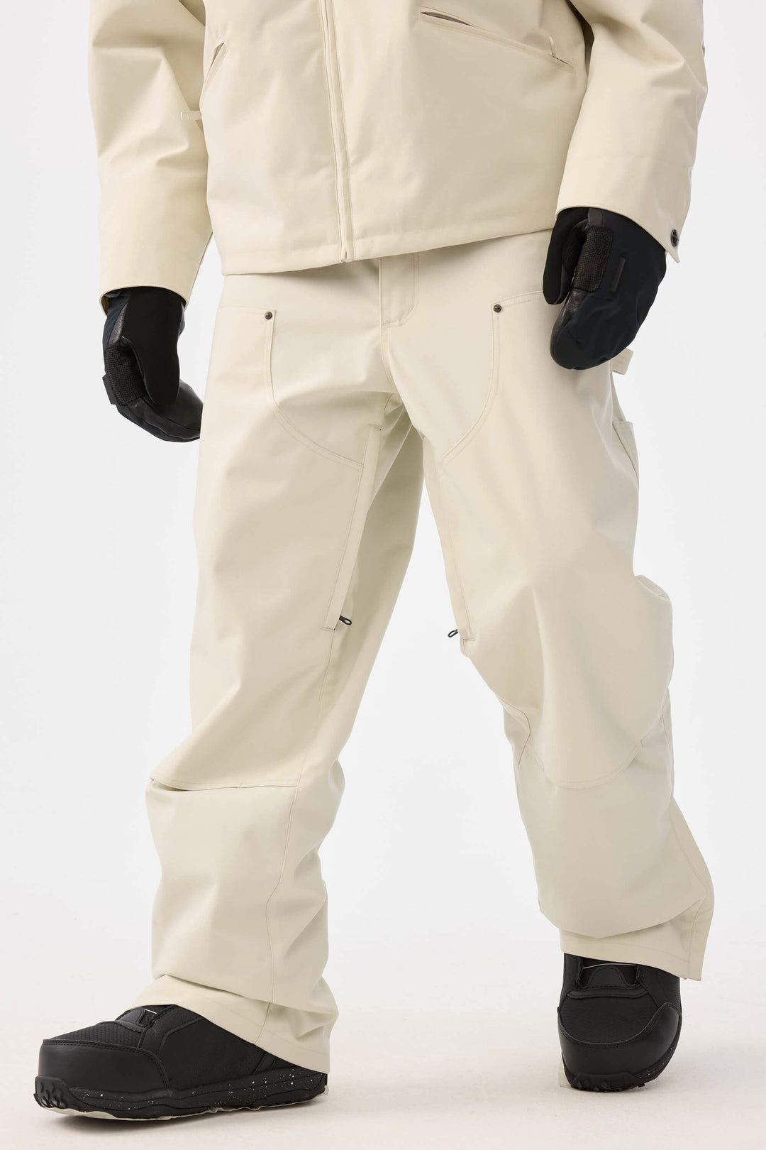 Męskie spodnie śnieżne w kolorze off-white z prostymi nogawkami i podwójnym przodem