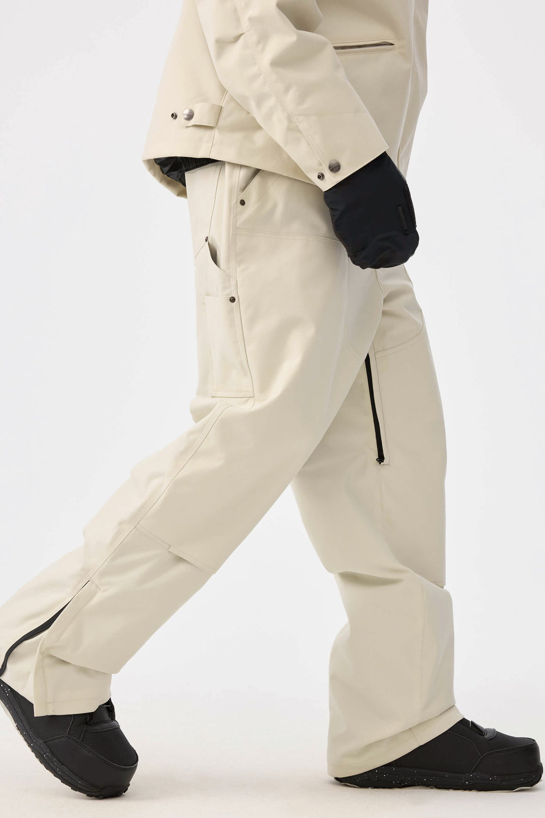 Męskie spodnie śnieżne w kolorze off-white z prostymi nogawkami i podwójnym przodem