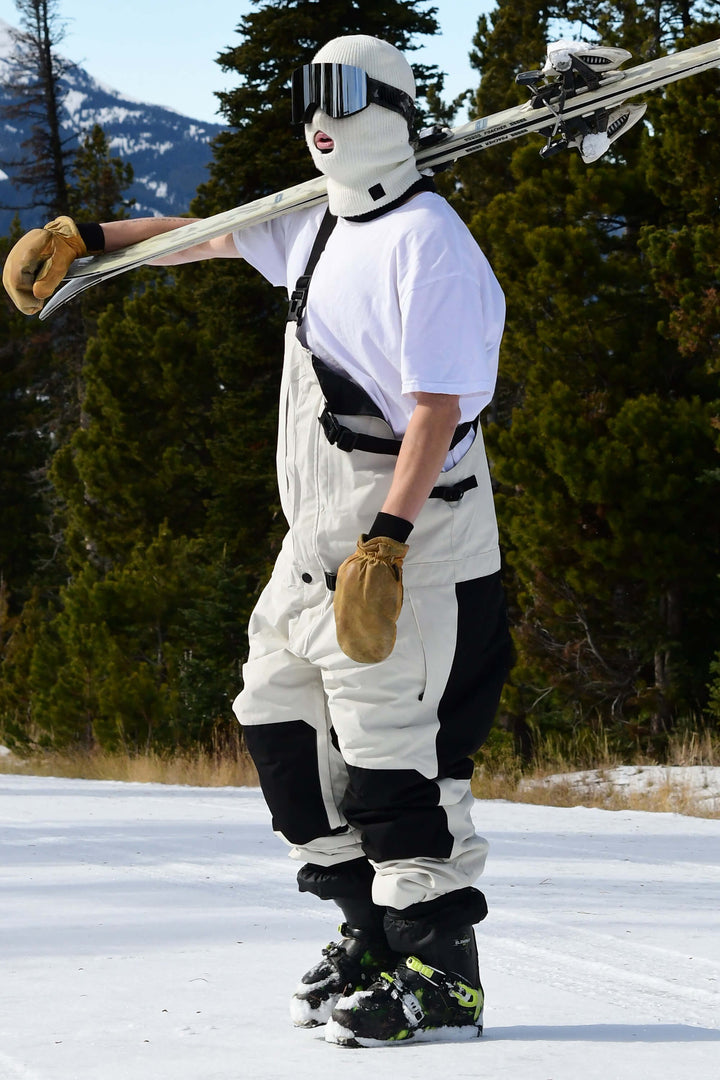 Witte sneeuwbroek voor heren met ritssluiting aan de voorkant en klittenbandsluiting