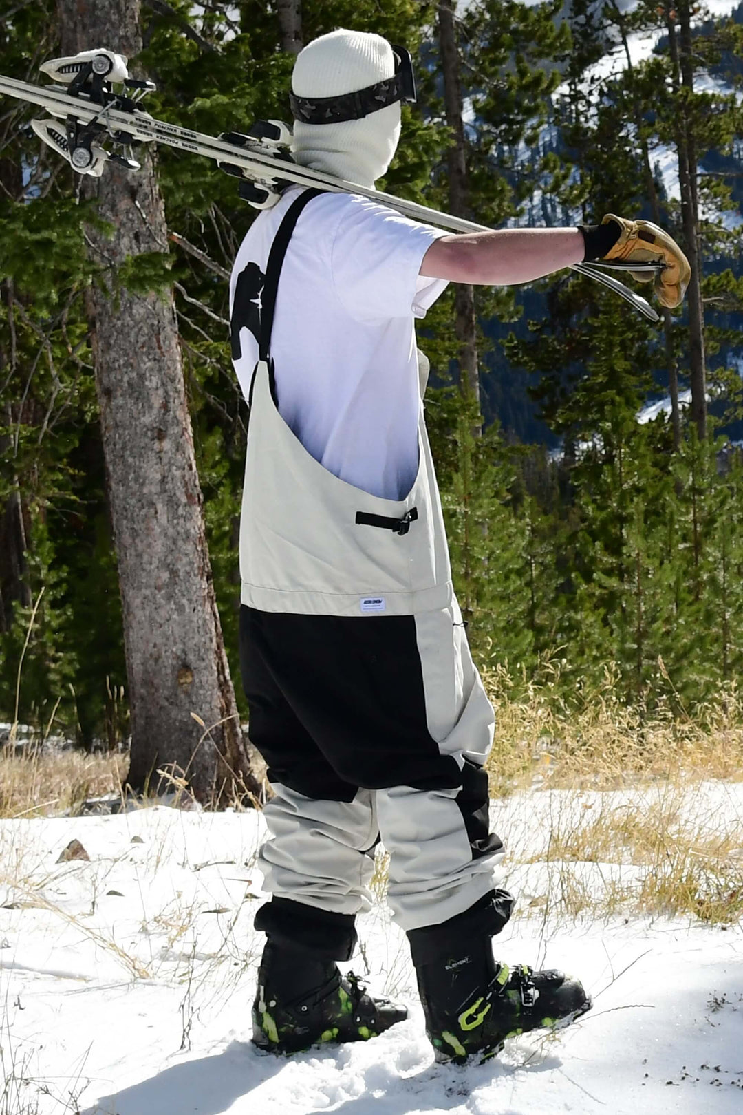 Witte sneeuwbroek voor heren met ritssluiting aan de voorkant en klittenbandsluiting