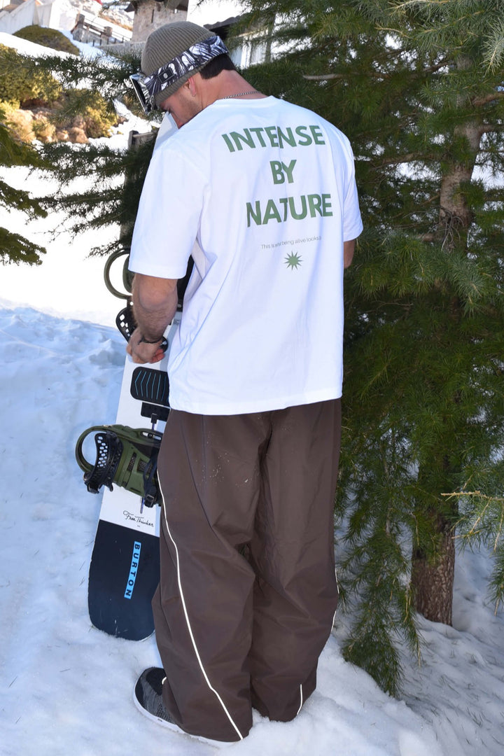 Herre svarte retro treningsbukser med reflekterende piping og baggy snø