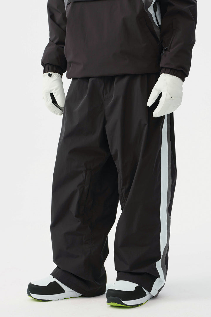 Heren zwarte en rode 90s retro track colorblock baggy sneeuwbroek