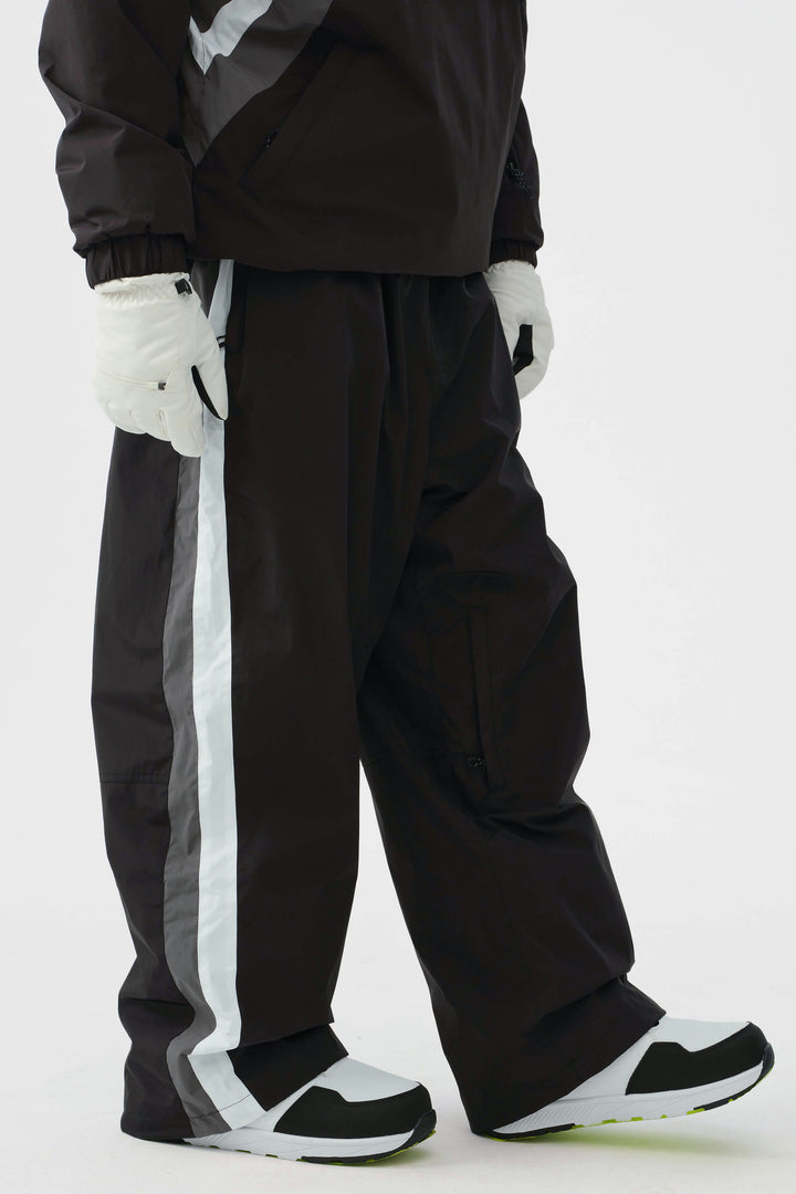 Heren zwarte en rode 90s retro track colorblock baggy sneeuwbroek