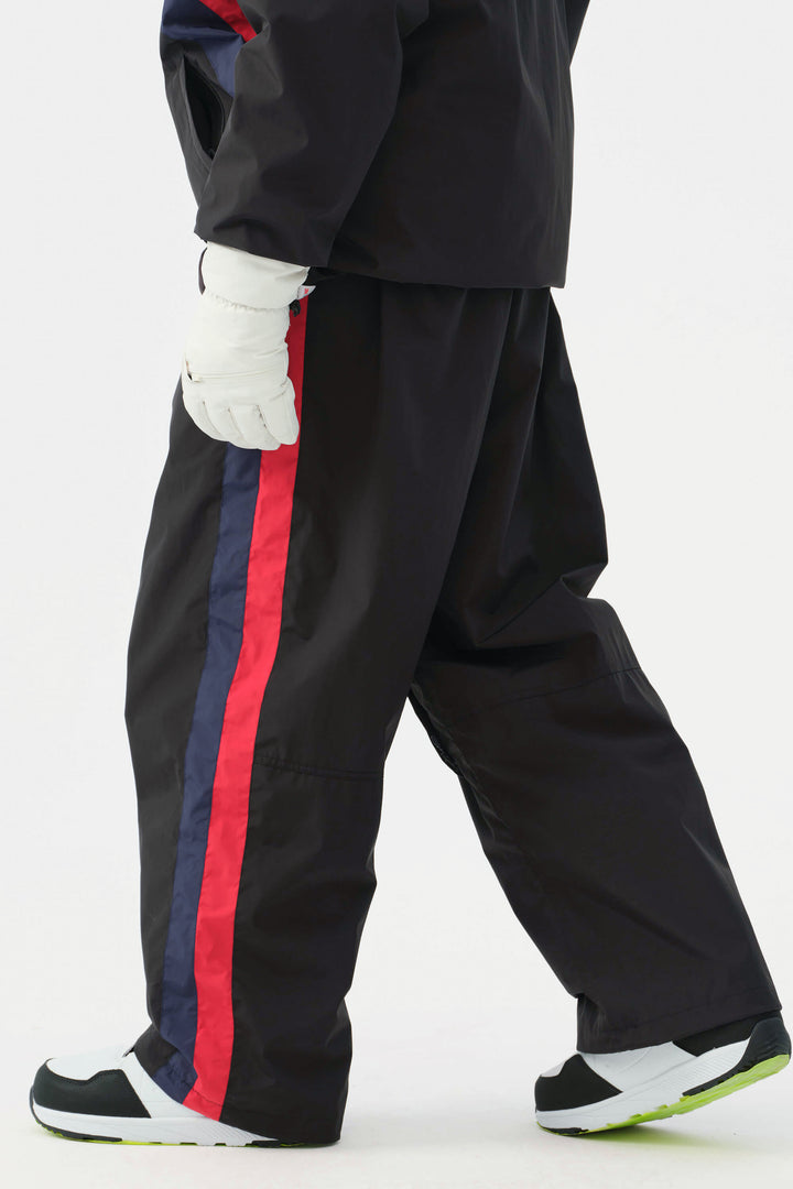 Heren zwarte en rode 90s retro track colorblock baggy sneeuwbroek