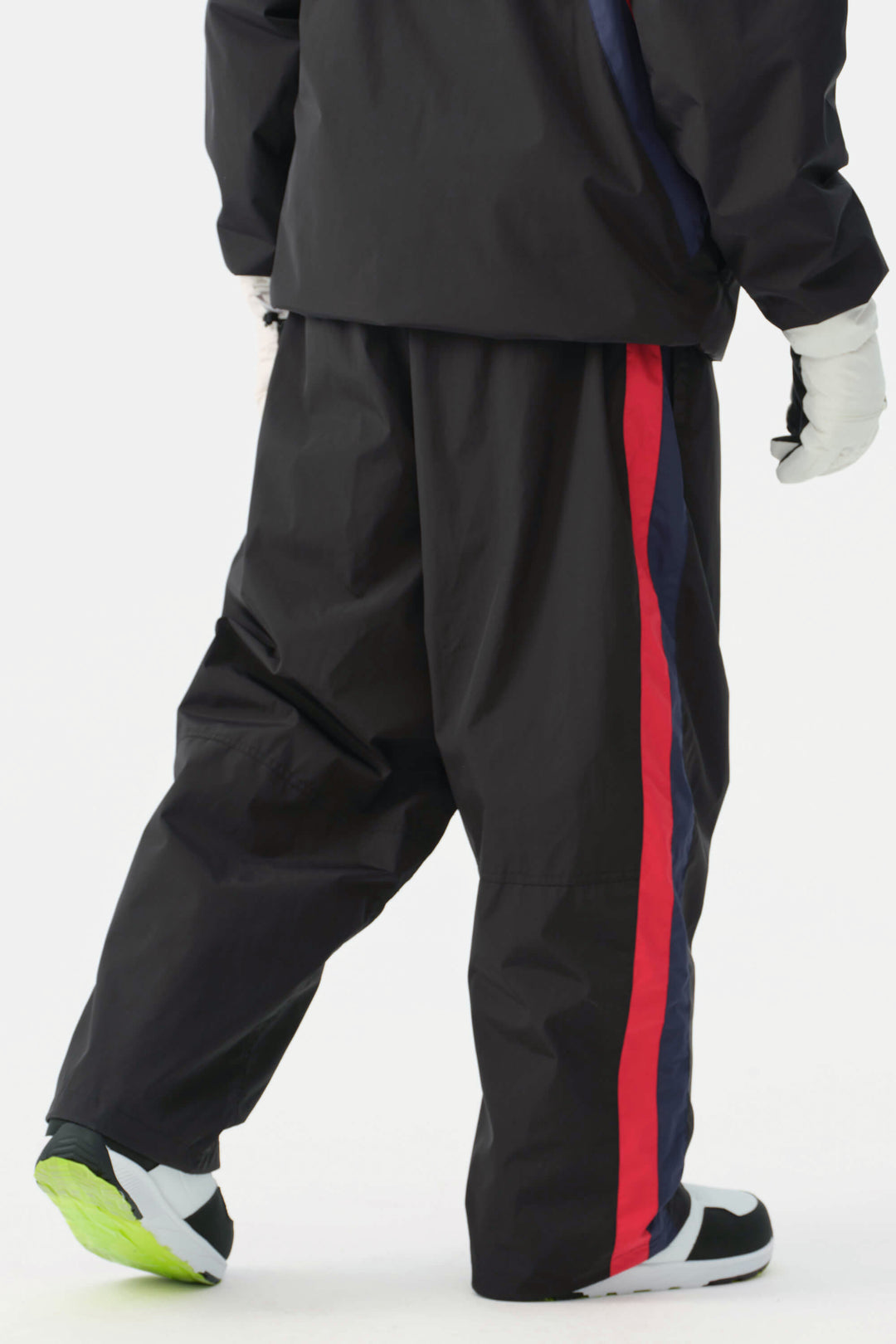 Heren zwarte en rode 90s retro track colorblock baggy sneeuwbroek