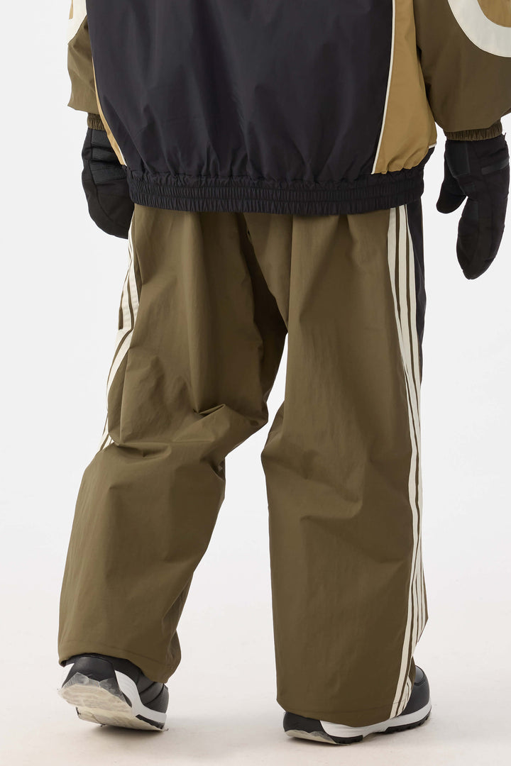 Damen-Schneehose im Retro-Sport-Stil mit Seitenstreifen in Olivgrün 