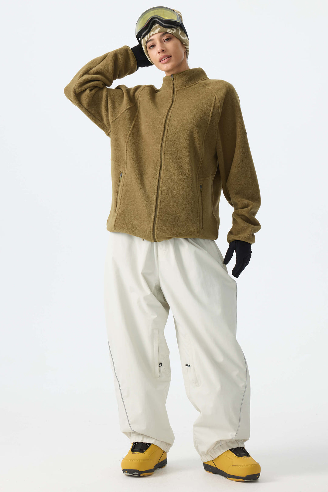Calça de neve feminina Off White, modelo baggy, com detalhes refletivos e cordão ajustável.