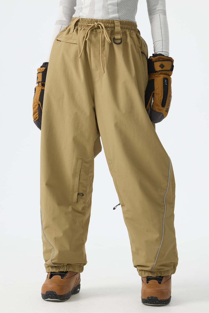 Calça de neve feminina Off White, modelo baggy, com detalhes refletivos e cordão ajustável.
