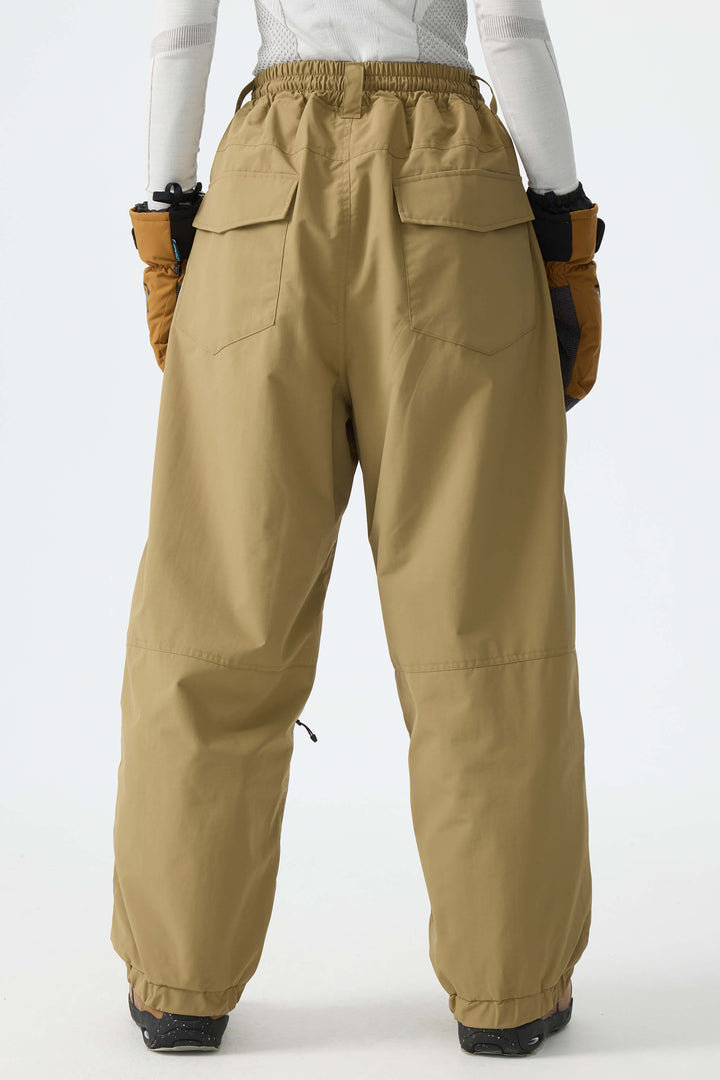 Calça de neve feminina cáqui, folgada, com detalhes refletivos e cordão.