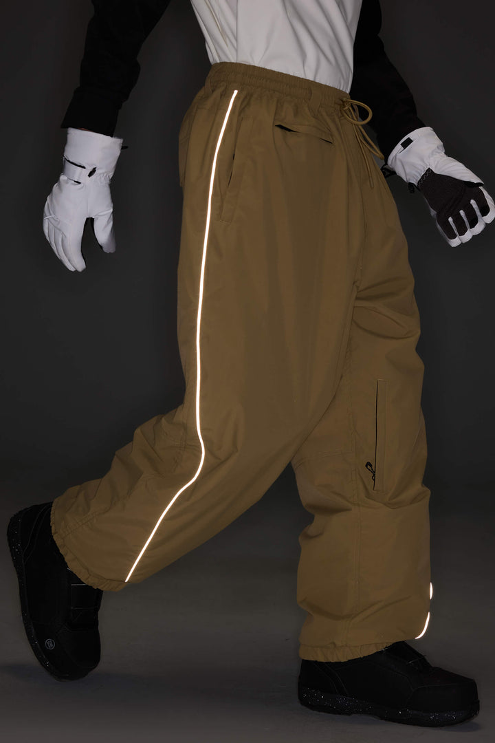 Calça de neve feminina Off White, modelo baggy, com detalhes refletivos e cordão ajustável.