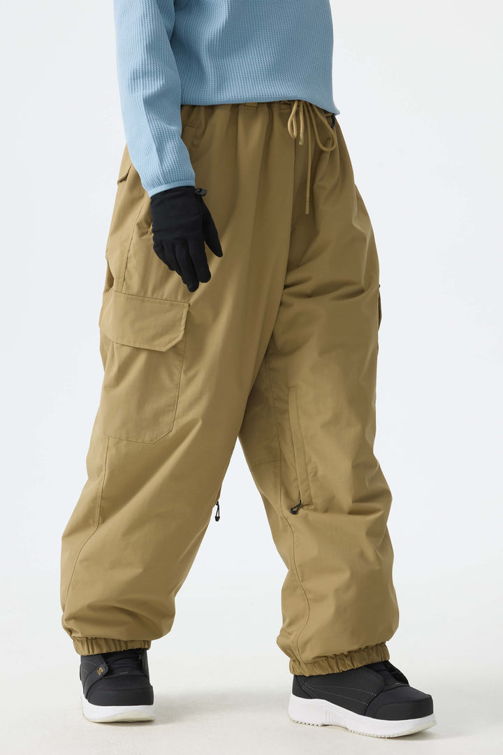 Calça de neve feminina preta, elegante, esportiva, utilitária, com bolsos cargo ocultos e modelagem folgada.