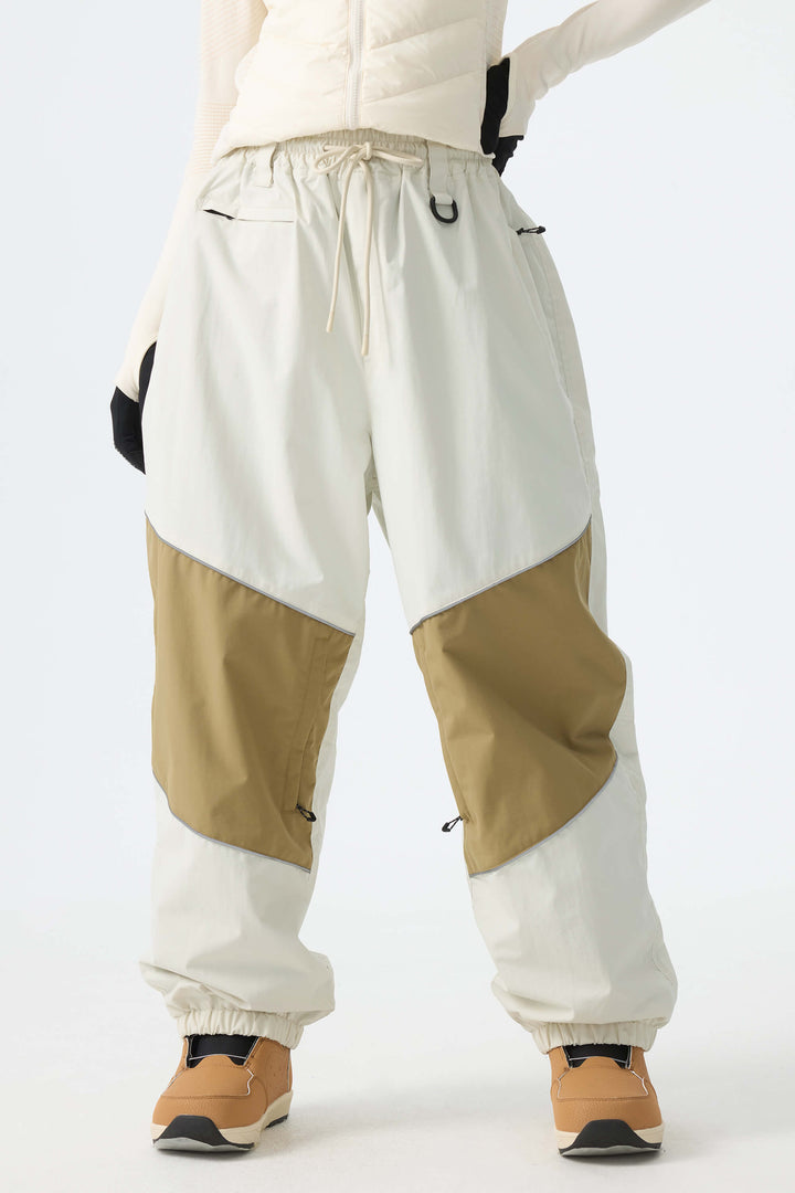 Calça de neve feminina preta, folgada e com detalhes refletivos