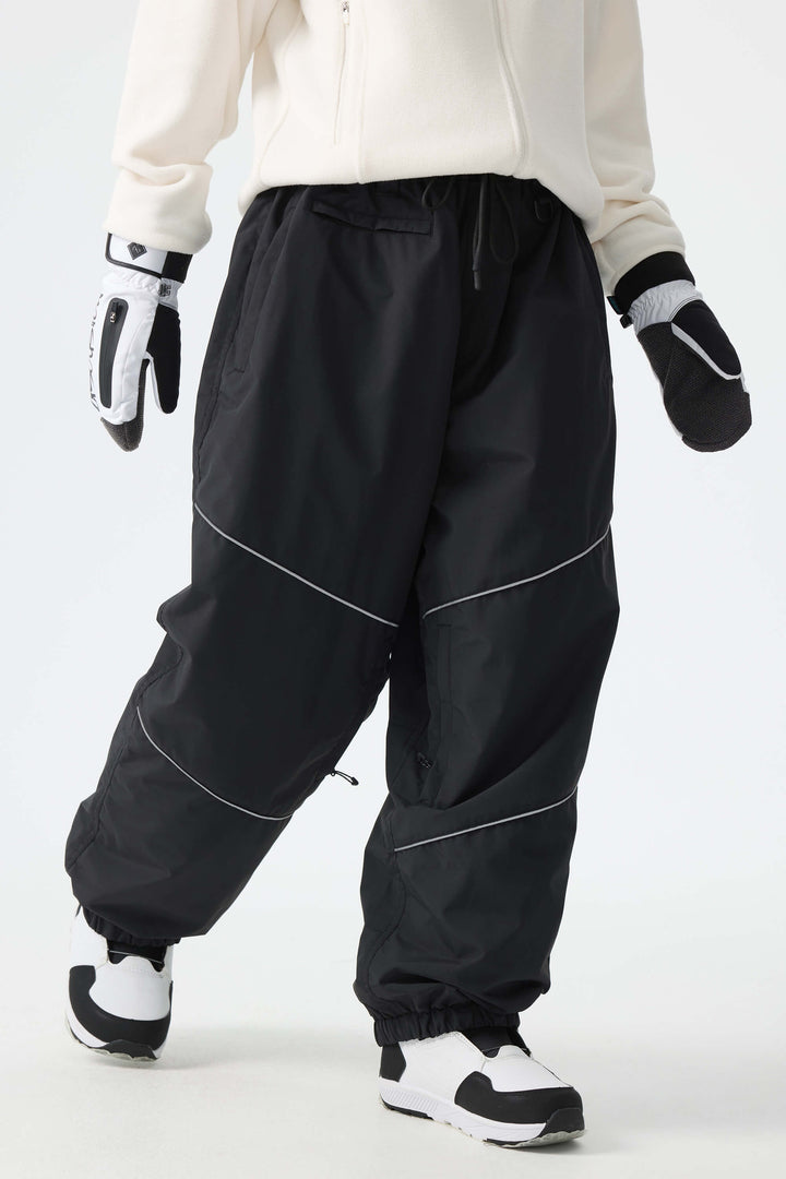 Calça de neve feminina preta, folgada e com detalhes refletivos