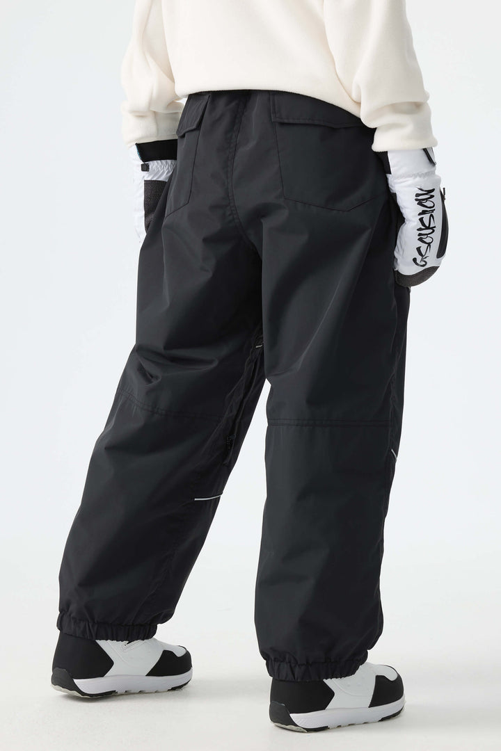 Calça de neve feminina preta, folgada e com detalhes refletivos