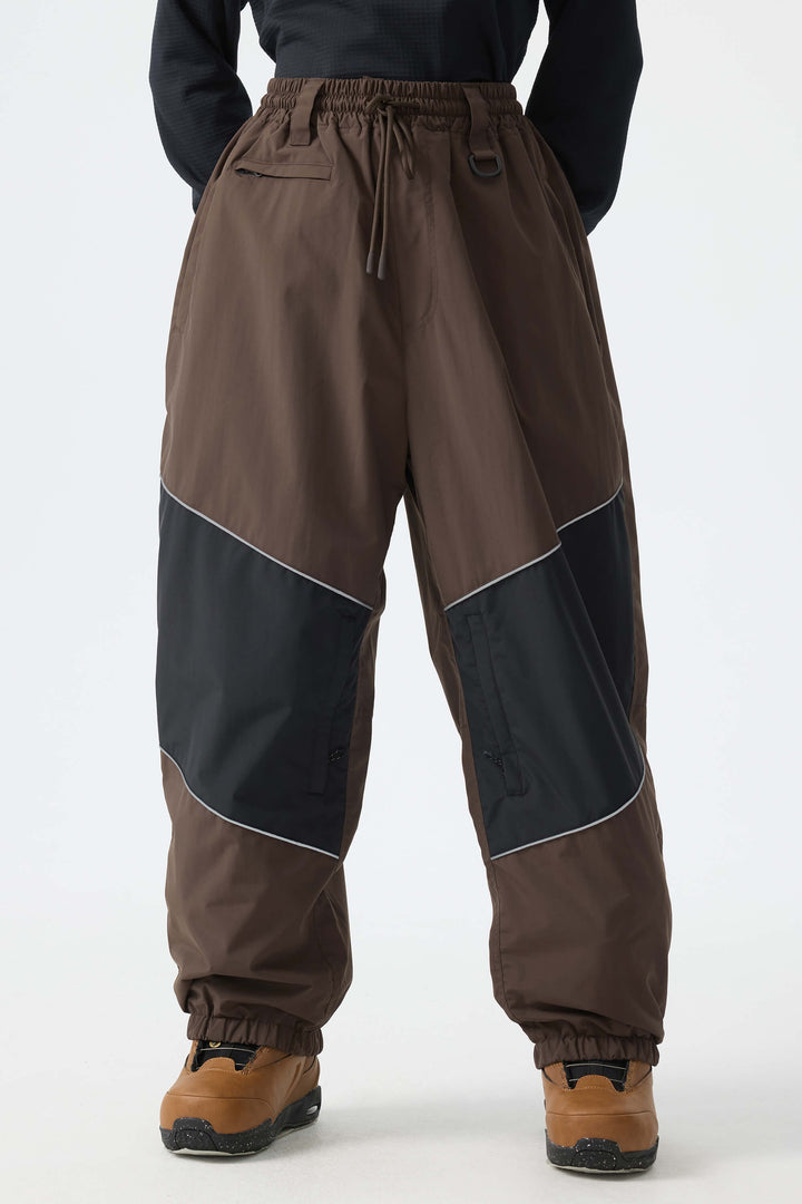Calça de neve feminina preta, folgada e com detalhes refletivos