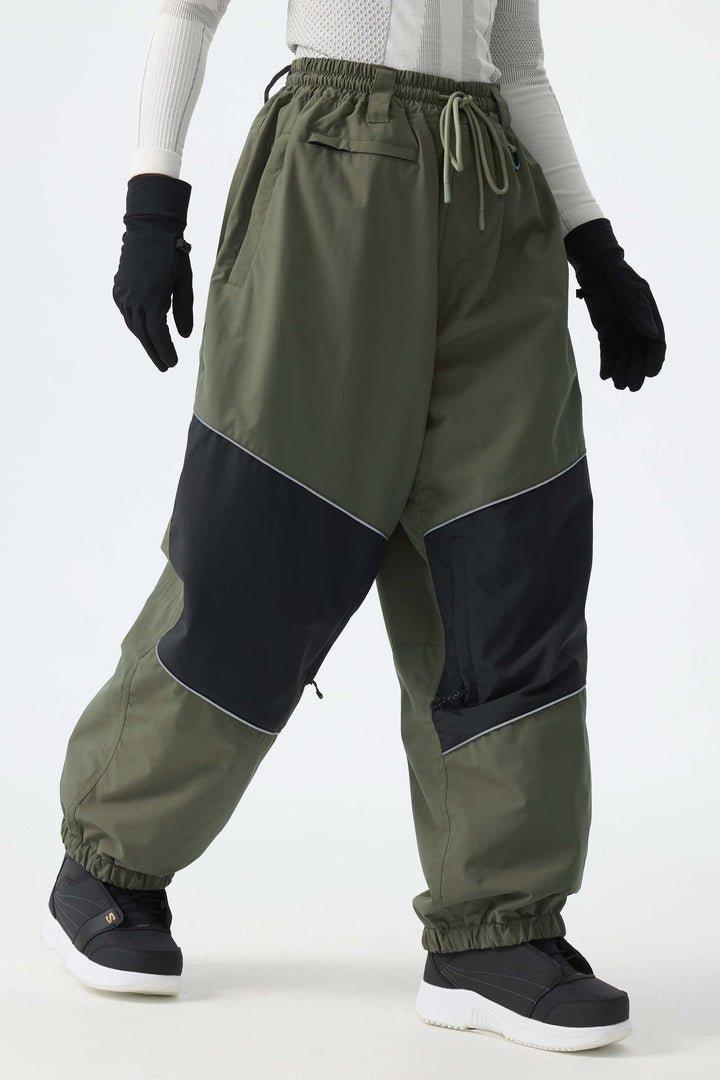 Calça de neve feminina preta, folgada e com detalhes refletivos