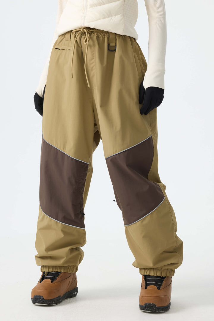 Calça de neve feminina preta, folgada e com detalhes refletivos