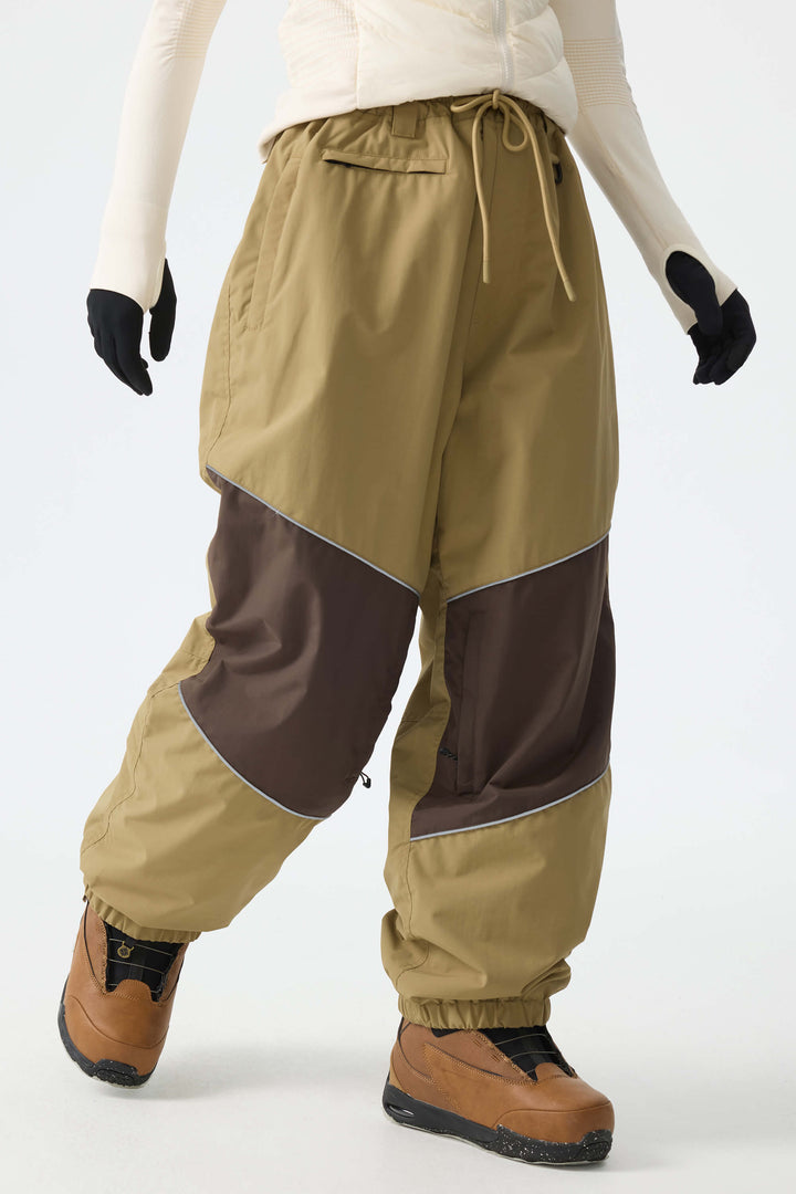 Calça de neve feminina preta, folgada e com detalhes refletivos