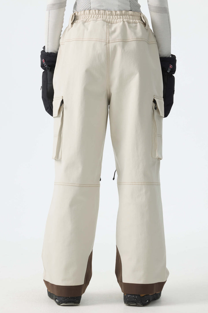 Calça de neve feminina Off White Barn com costura contrastante e modelagem ampla.