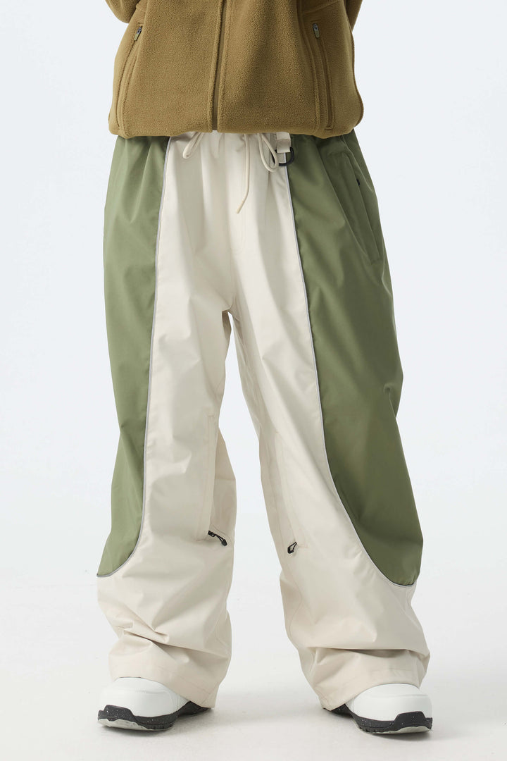 Calça de neve feminina preta, larga e com detalhes refletivos.
