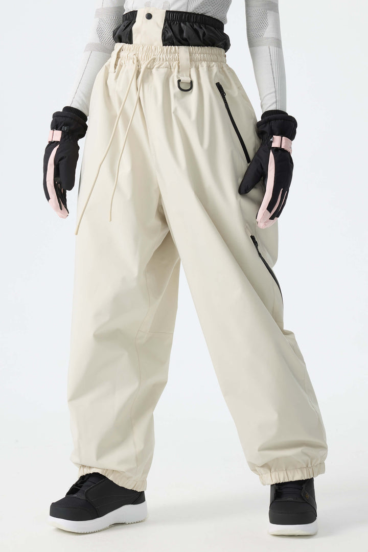 Calça de neve feminina preta, folgada e com cordão.