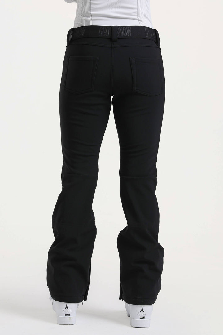 Naisten tummanruskeat, kapeat, vedenpitävät ja levenevät hiihtohousut